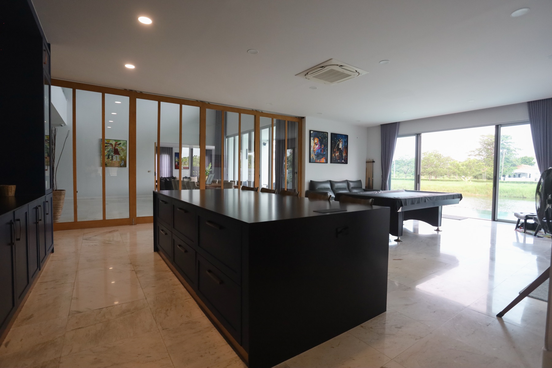 Bar and games room with granite island and lake views